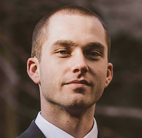 Thomas Whitfield, analista di trading ed esperto di mercato crypto, headshot